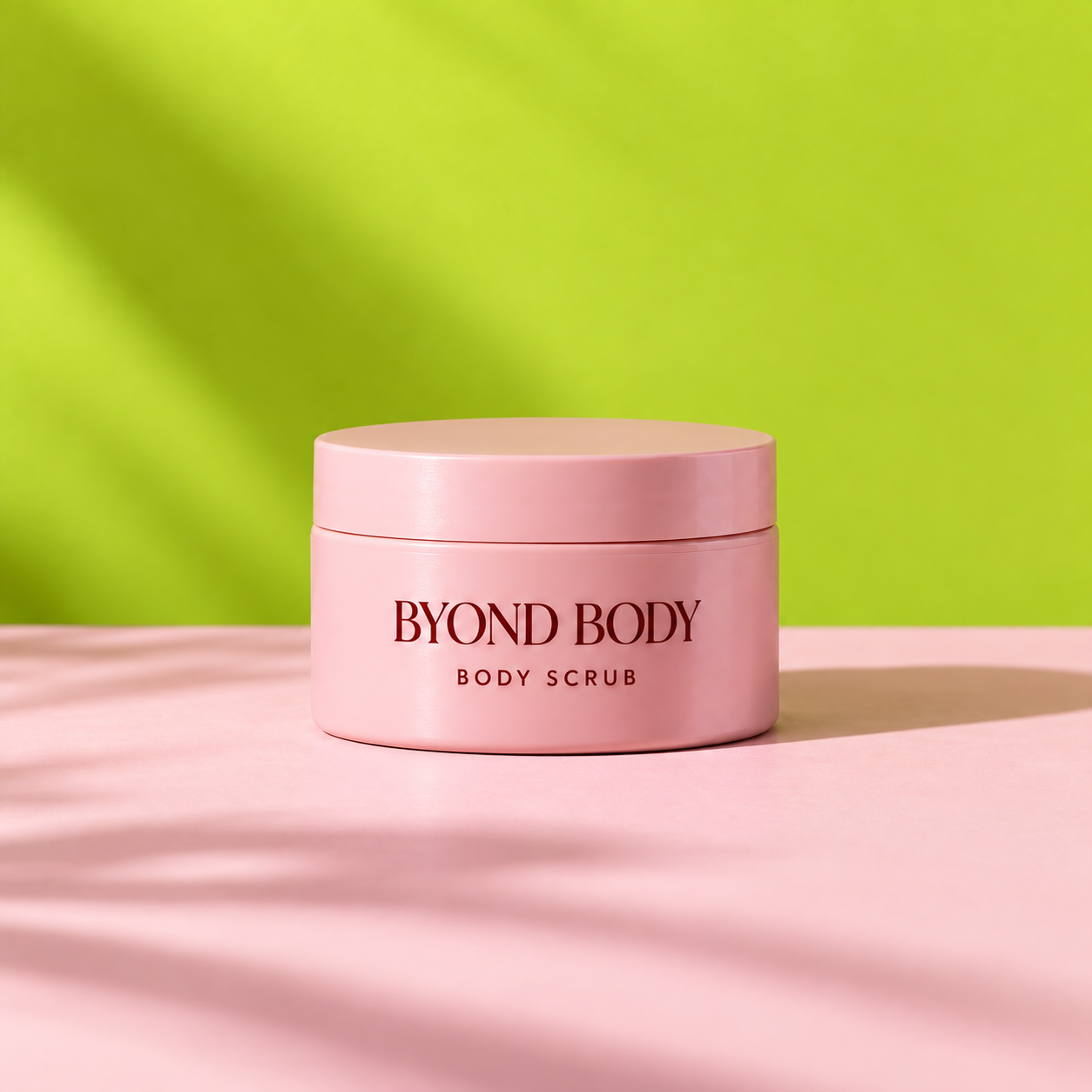 A single pink Byond Body scrub jar, illustrative packaging